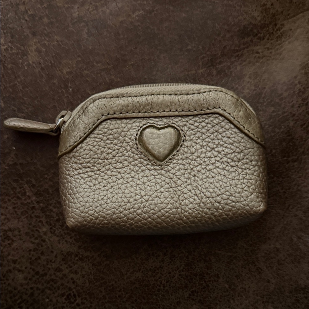 metallic gold leather coin purse by Brighton featuring a small heart emblem
